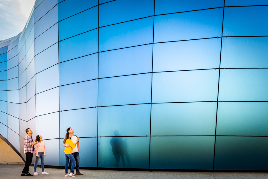 Couple examining Pacific Visions glass